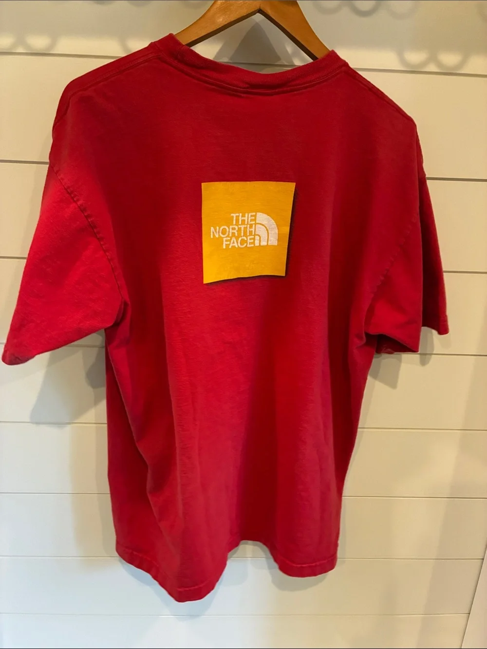 The North Face Vintage  Men's Red Short Sleeve Tee with Yellow Logo Patch